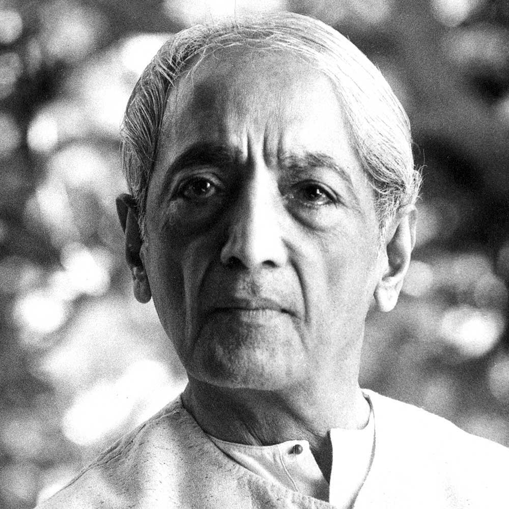 Black and white portrait of J. Krishnamurti